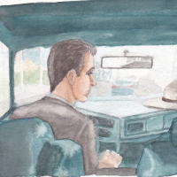 man sitting in a car